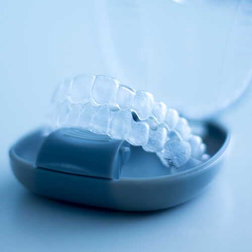 Close up of a set of Invisalign clear aligners